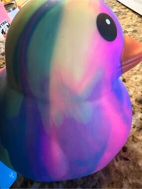 Squeezy tie die squishy duck toy